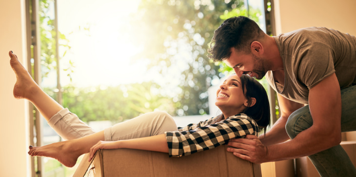 Young couple moving into new home