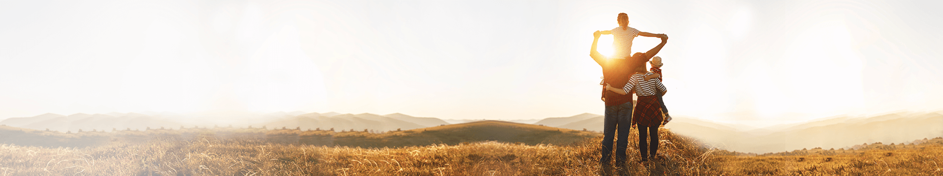 Family watching the sunset